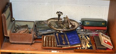 Lot 190 - A quantity of silver and silver plated items to include: a swing handled basket; cased tea...