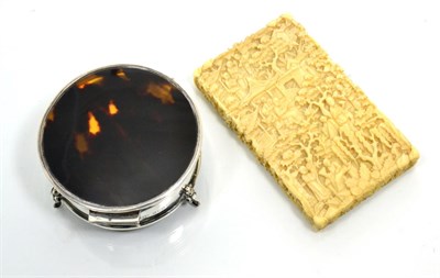 Lot 219 - A late 19th century Chinese carved ivory card case; and a silver and tortoiseshell circular trinket