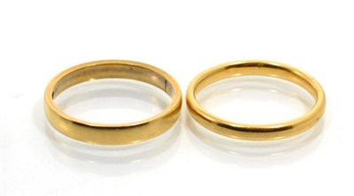 Lot 227 - Two 18 carat gold band rings, each finger size N