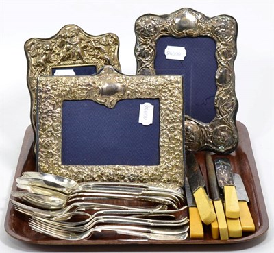 Lot 251 - Three silver photograph frames and plated flatware