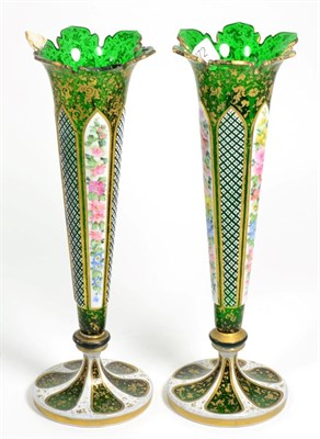 Lot 272 - A pair of Bohemian green glass floral painted vases (a.f.)