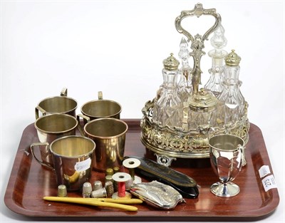 Lot 273 - A small twin handled trophy cup; a silver purse; four silver thimbles; a Victorian...