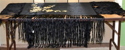Lot 274 - Early 20th century black silk shawl embroidered with flowers, long fringing