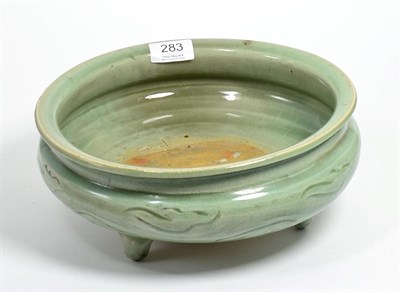 Lot 283 - A Chinese green Celadon jardiniere