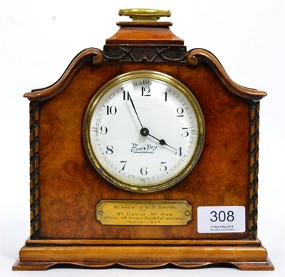 Lot 308 - An Art Deco mantel timepiece with presentation plaque, enamel dial ''The Time Day''