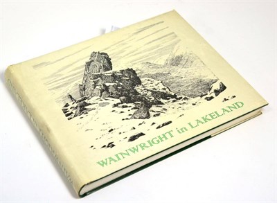 Lot 318 - Wainwright in Lakeland, signed edition together with folding map, No 785, 1983