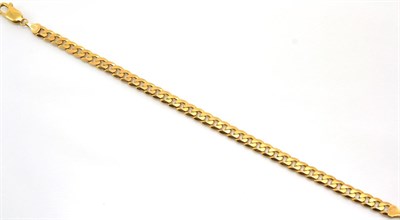 Lot 336 - A Cuban link bracelet, length 21.5cm, stamped '375'