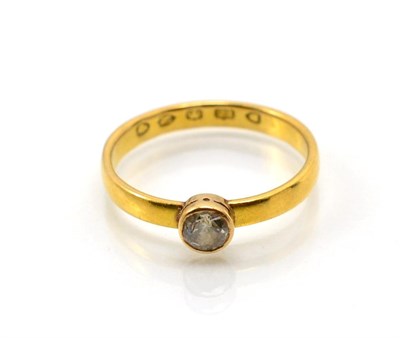 Lot 340 - A 22 carat gold solitaire diamond ring, an old cut diamond in a rubbed over setting, to...