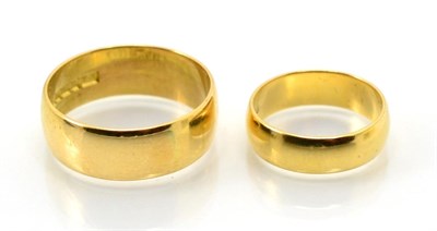 Lot 343 - Two broad 18 carat gold band rings, finger size R1/2 and I (2)