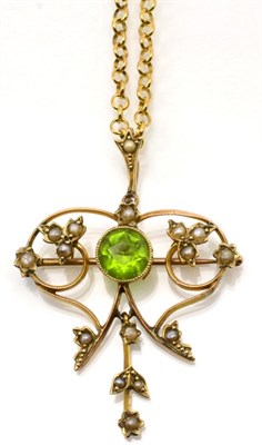 Lot 361 - An Edwardian green paste and seed pearl brooch/pendant, a round cut paste on a milgrain...