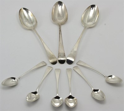 Lot 369 - Three George III silver Old English pattern table spoons, various dates and makers; and a set...