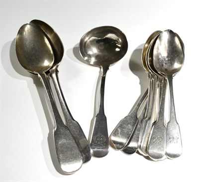 Lot 370 - A group of silver fiddle pattern flatware, comprising: a matched set of six George...