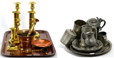 Lot 391 - A pair of Georgian brass candlesticks and a pair of Victorian brass candlesticks, a pestle and...