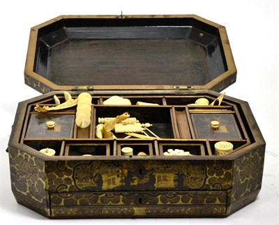 Lot 395 - A 19th century Chinese black lacquered octagonal sewing box, with assorted bone and ivory...