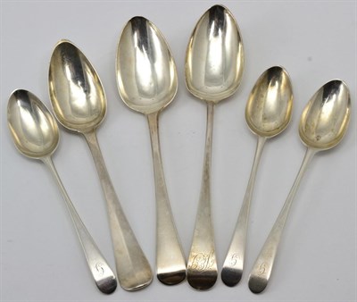 Lot 416 - Three George III silver dessert spoons, Hester Bateman, London 1785; a table spoon, Thomas...