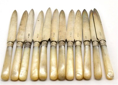 Lot 419 - A set of twelve Edwardian silver fruit knives, Allen & Darwin, Sheffield 1902, with mother of pearl