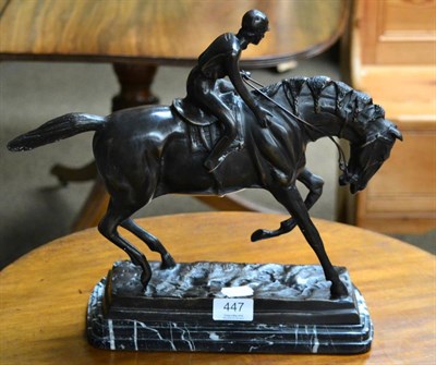 Lot 447 - A bronze depicting a jockey on horseback, after Mene