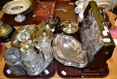 Lot 459 - A three bottle tantalus, together with a group of silver plate and a silver pepperette (two trays)