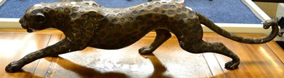 Lot 471 - A modern bronze figure of a leopard, 118cm in length