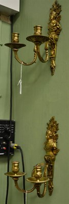 Lot 478 - A pair of bronze twin light wall sconces