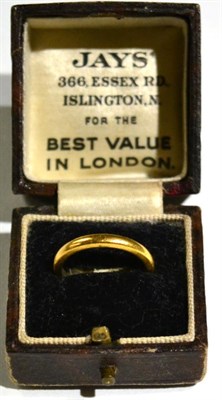 Lot 484 - A band ring, finger size K1/2, stamped 'PLATINUM 22CT'