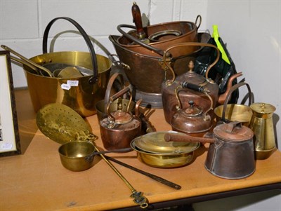 Lot 1063 - A collection of 19/20th century copper and brasswares including bed warmer, kettles, pans etc