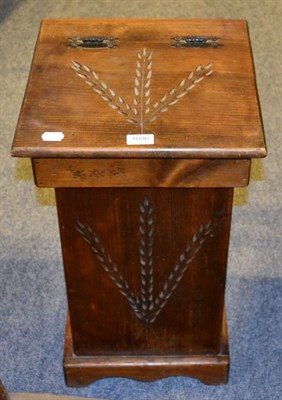 Lot 1096 - A carved wheatsheaf bin