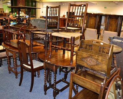 Lot 1113 - A group of oak furniture including a 1920s two tier trolley, occasional table, magazine rack, 1920s