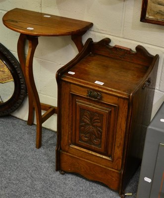 Lot 1134 - An oak folding occasional table, two oval mirrors and an early 20th century oak coal purdonium (4)