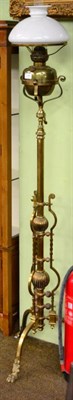 Lot 1246 - A Victorian brass floor standing telescopic standard oil lamp