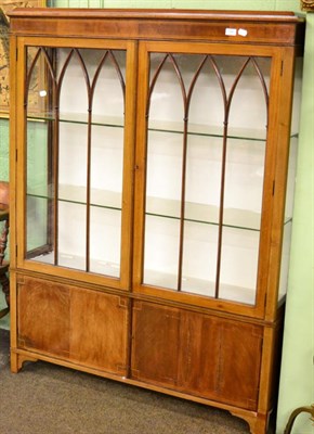 Lot 1247 - An Edwardian inlaid mahogany display cabinet