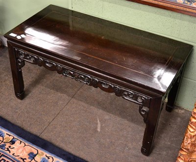 Lot 1251 - A Chinese low table with decorative apron