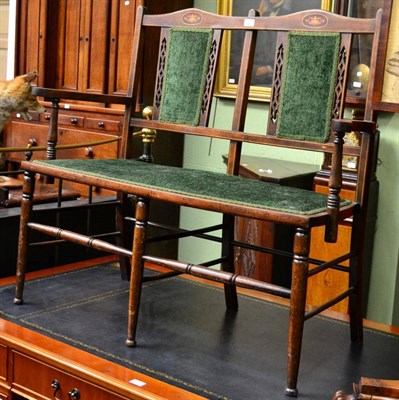 Lot 1270 - An Edwardian mahogany inlaid double seated settee