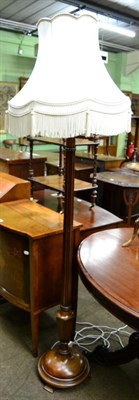 Lot 1276 - An inlaid mahogany bow front low cabinet together with a standard lamp (2)