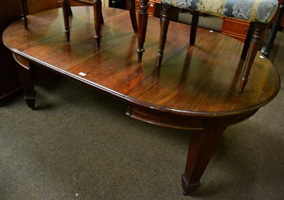 Lot 1279 - Early 20th century mahogany extending dining table with two leaves raised on square tapering legs