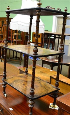 Lot 1281 - A Victorian inlaid walnut three tier whatnot