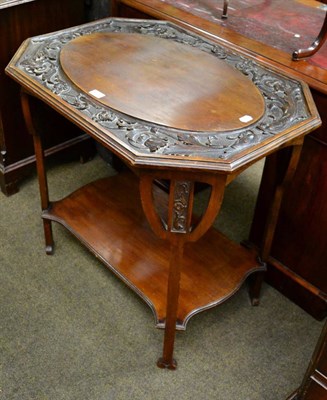 Lot 1286 - An Edwardian mahogany carved occasional table