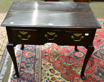 Lot 1295 - An 18th century oak lowboy