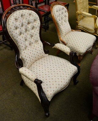 Lot 1297 - A Victorian mahogany framed button backed open arm chair together with a similar nursing chair (2)