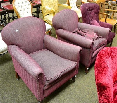 Lot 1301 - A pair of purple upholstered 1920s tub chairs and another button backed chair (3)