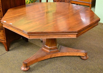 Lot 1308 - A Regency rosewood octagonal shaped centre or dining table, early 19th century, raised on a...