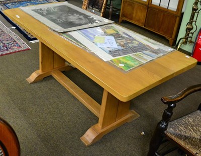 Lot 1312 - A modern light oak dining table