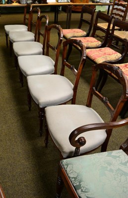 Lot 1315 - A set of six Victorian carved mahogany balloon back dining chairs