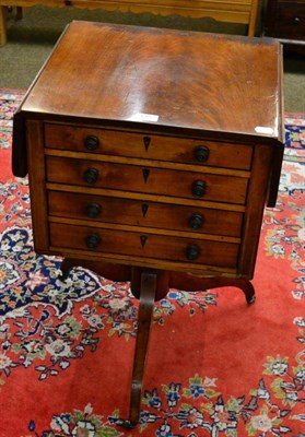 Lot 1322 - An early 19th century mahogany sewing table