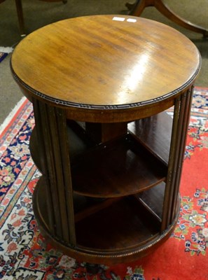 Lot 1323 - An early 20th century mahogany revolving book stand