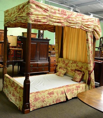 Lot 1331 - A 19th century style four poster bed by Stanley of Brompton