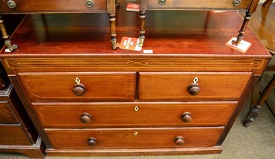 Lot 1336 - A 19th century three height chest of drawers