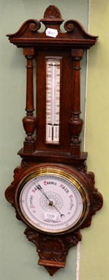 Lot 1338 - An oak cased aneroid barometer, circa 1910