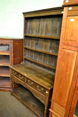 Lot 1343 - An oak low dresser and rack of small proportions