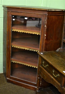 Lot 1344 - A 19th century freestanding glazed corner cabinet, with three leather trimmed fixed shelves and...